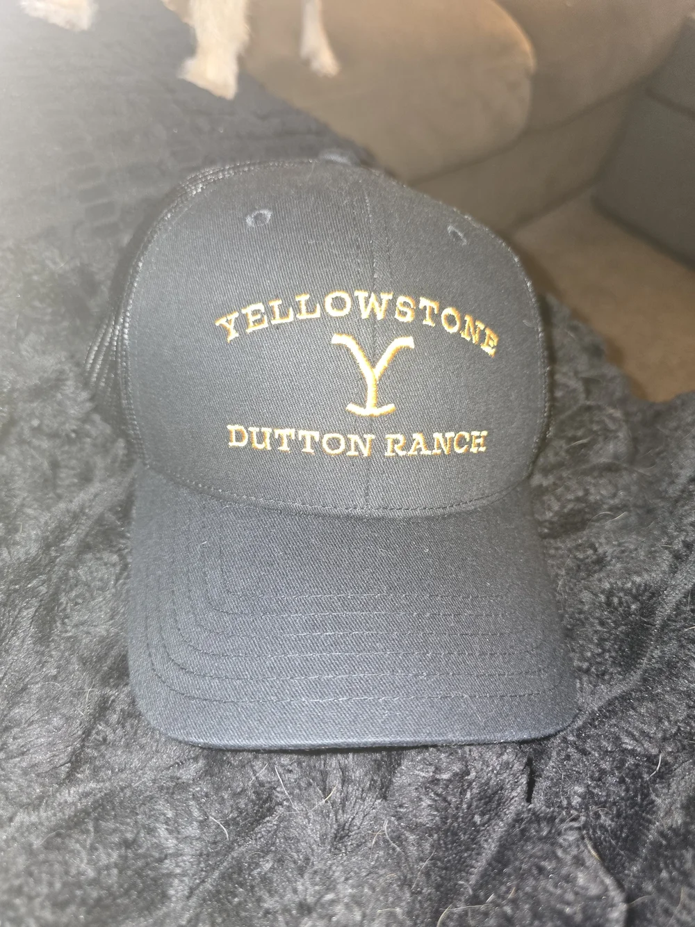 Yellowstone Dutton Ranch Black Trucker Hat with Gold Logo Embroidery